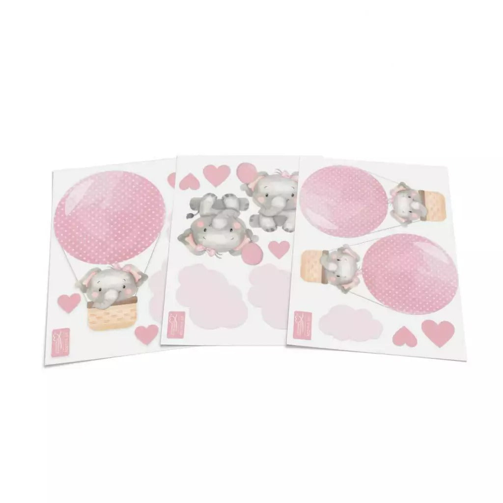 Combo de globos y elefantes con nubes rosas