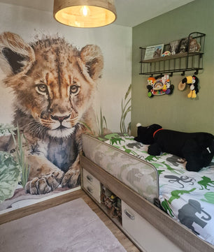 Papel para paredes León joven en la jungla