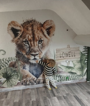 Papel para paredes León joven en la jungla