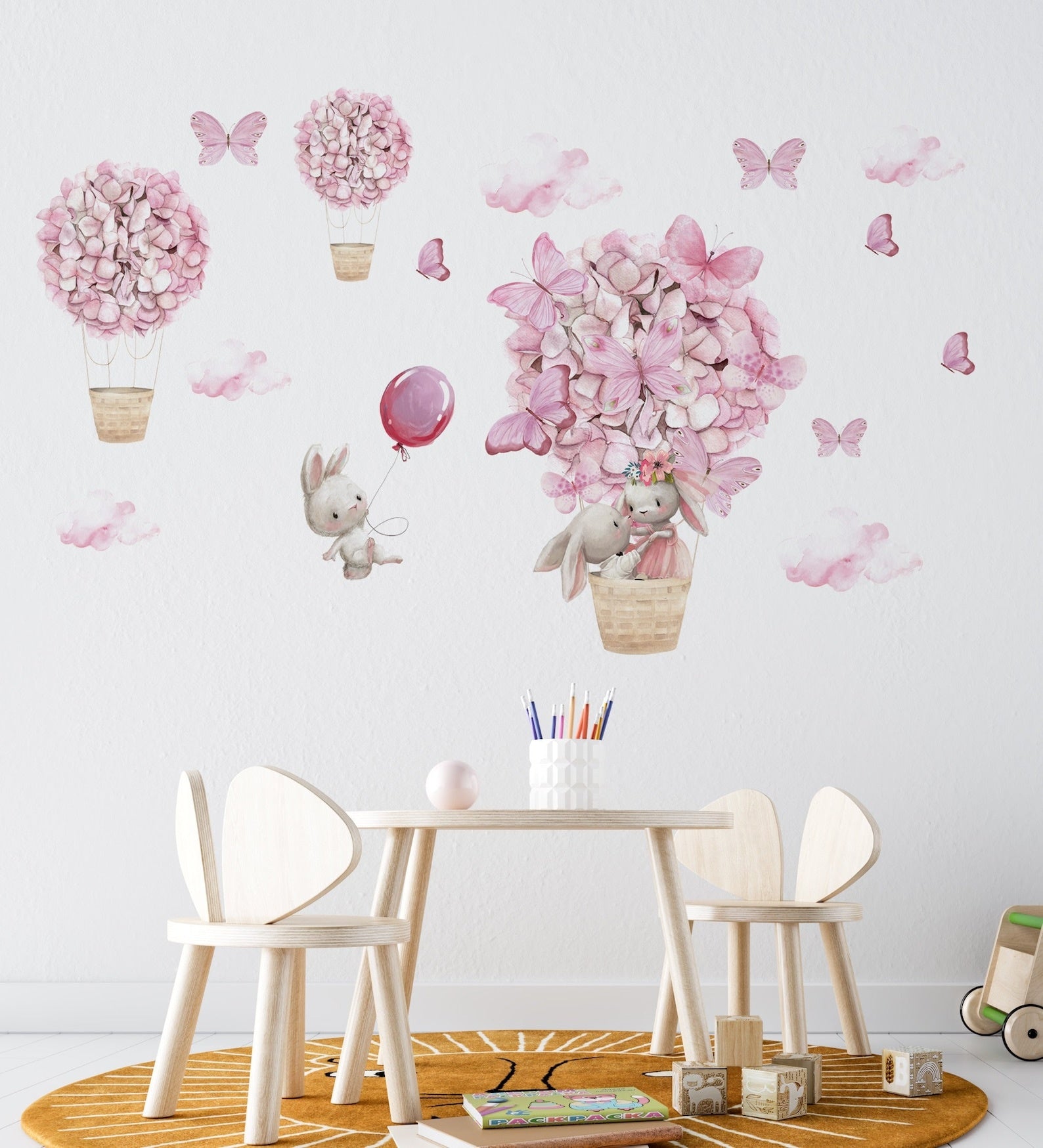 Vinilos decorativos Adhesivos infantiles de Pared Conejos en globo aerostatico de mariposas